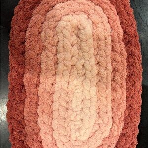 Cozy Pink and cream oval mat, pet bed or nesting pod for baby/stroller